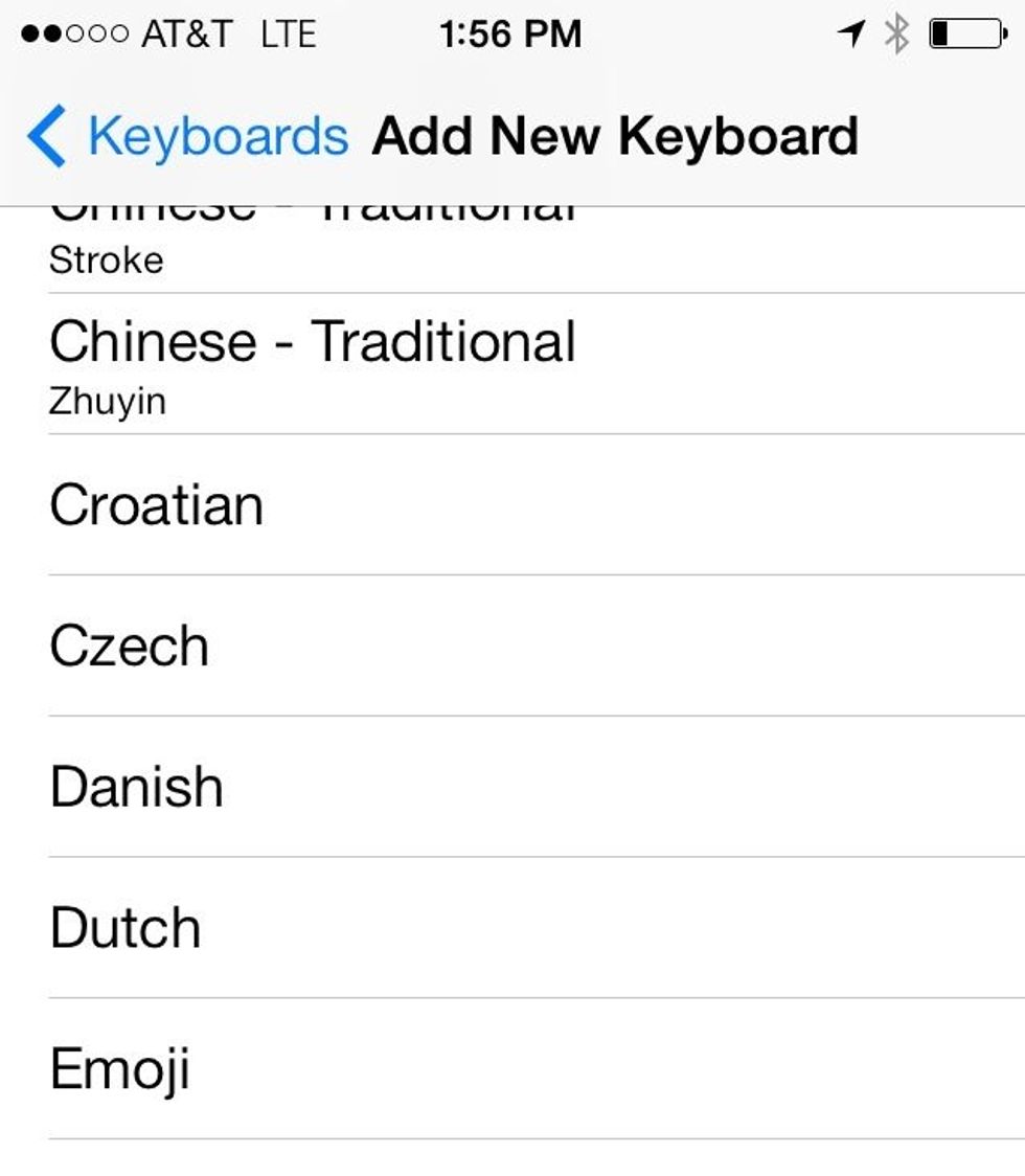 Scroll down to Emoji.  Tap "Emoji".  Your keyboard is now enabled.