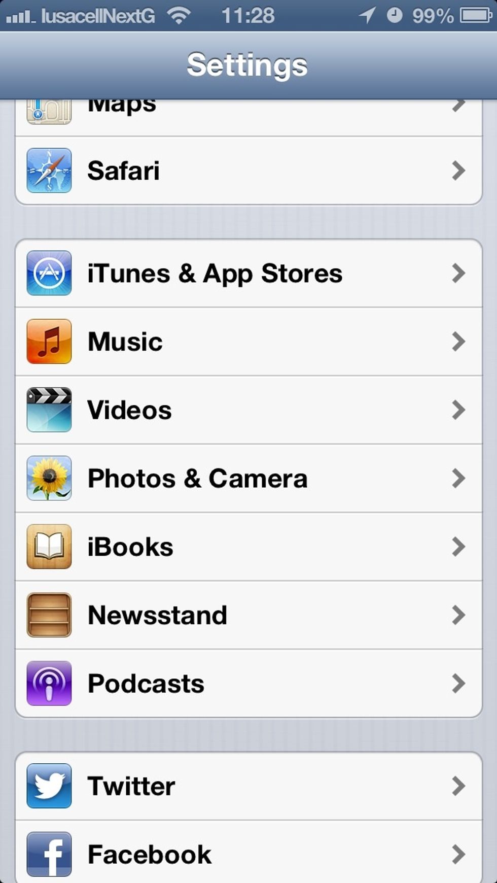 Scroll down to the 'iTunes & App Stores' menu item on the first settings menu screen.