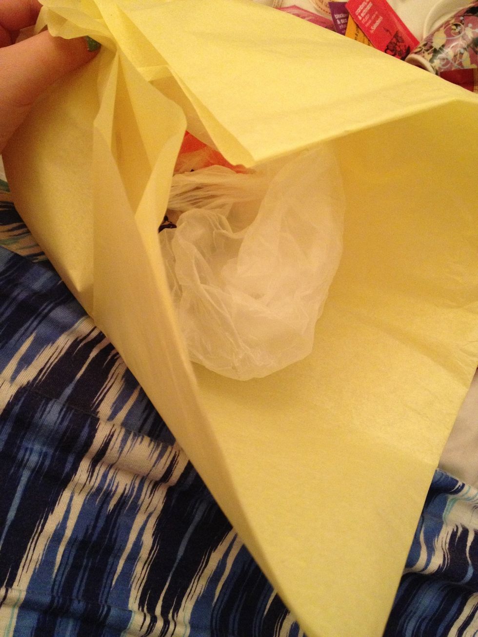 Scrunch a plastic bag and loosely cover with tissue paper