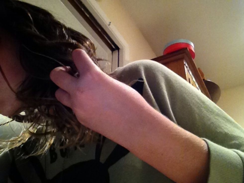 Scrunch warm oil into your hair