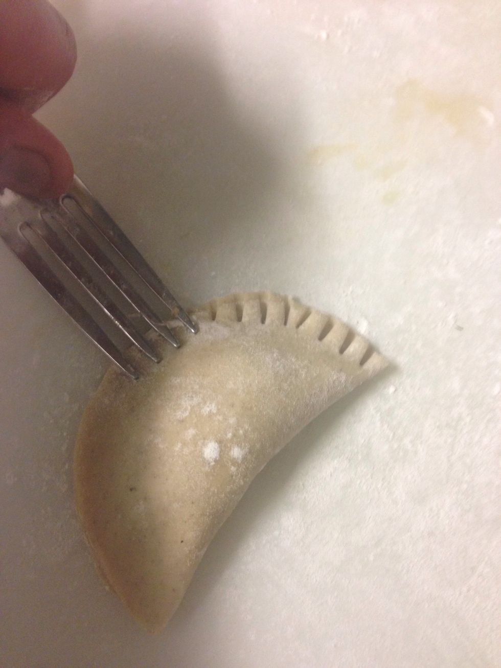 Seal it making the marks whit a fork