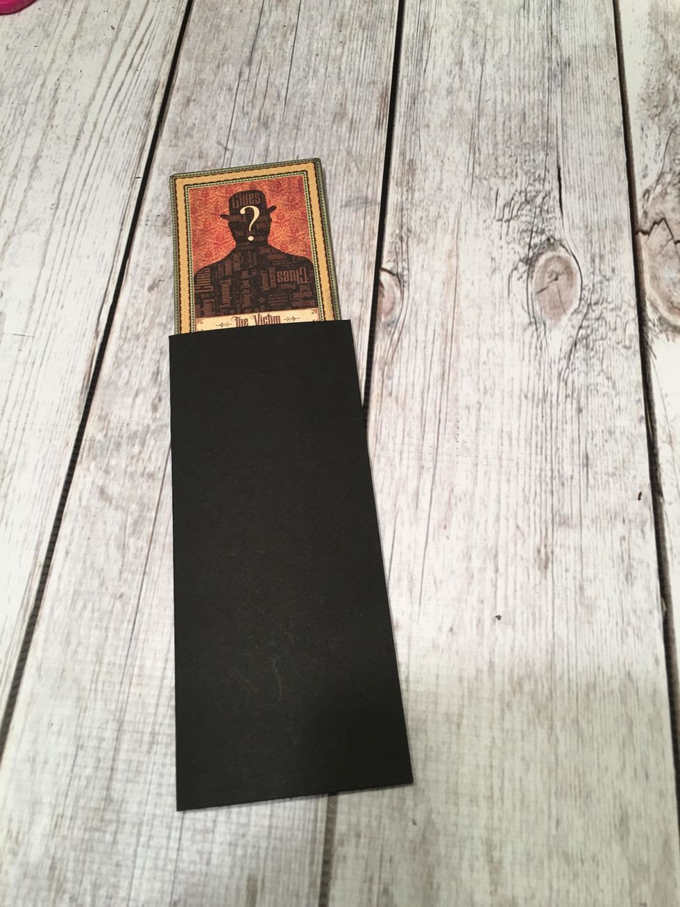 Seal shut with the image sticking out of the top.