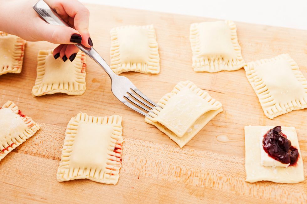 Seal the edges of your bites by crimping with the fork.