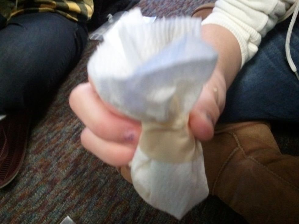 SEAL THE ORGANS- Use masking tape to seal the paper towel by wrapping it just above the ball of pulp.  Do not wrap the pulp with tape as that prevents the moisture's escape through the paper towel.