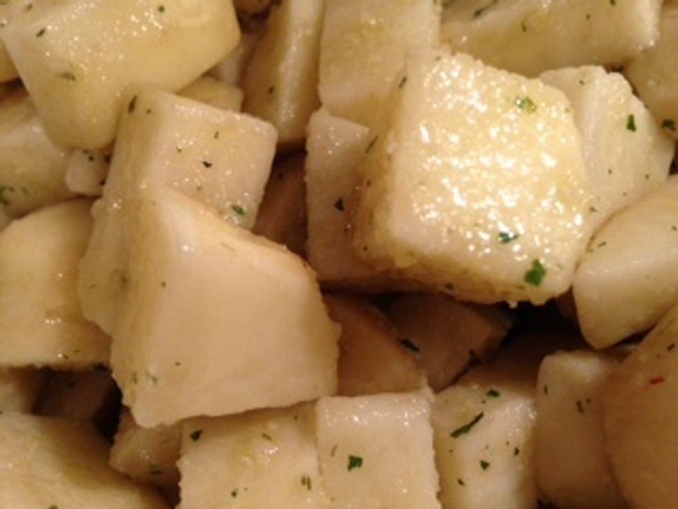 Seal Ziploc and shake vigorously until all potatoes are covered.