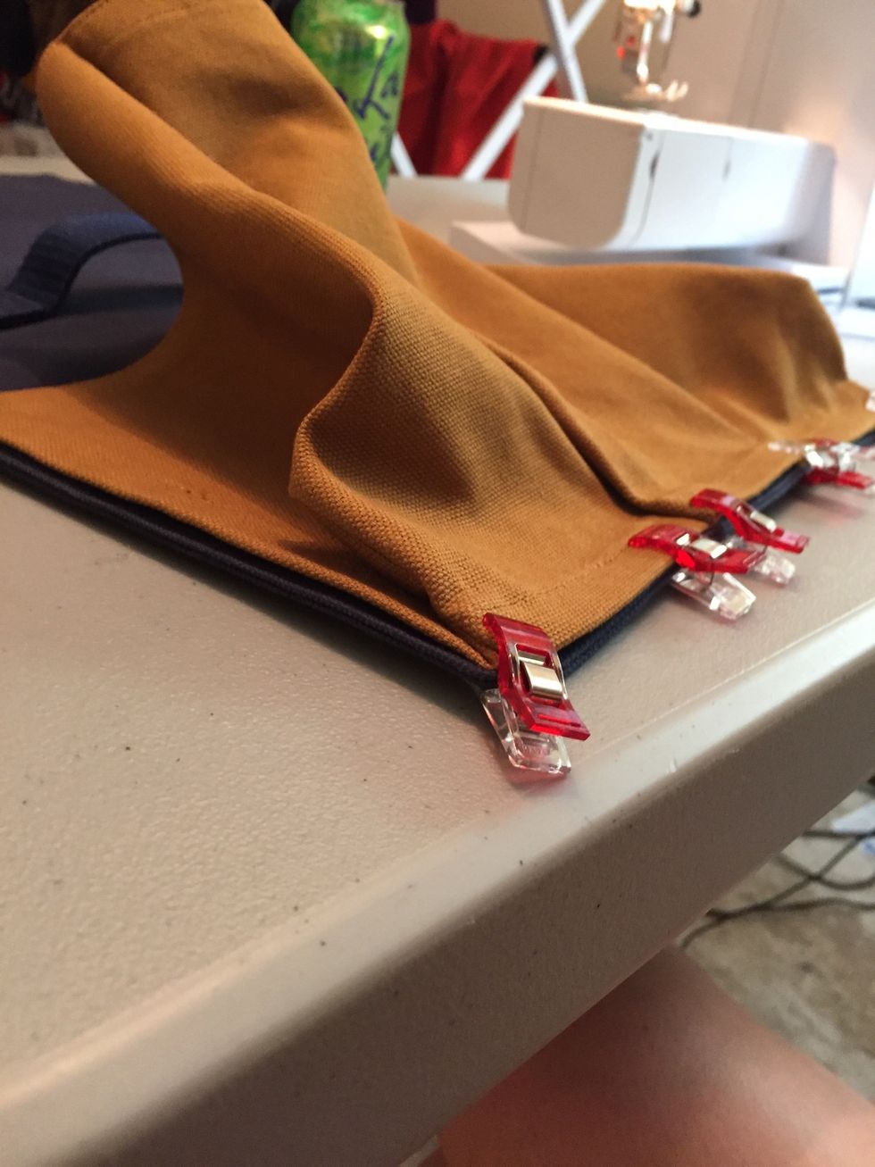 Seams should be tucked towards center of holder