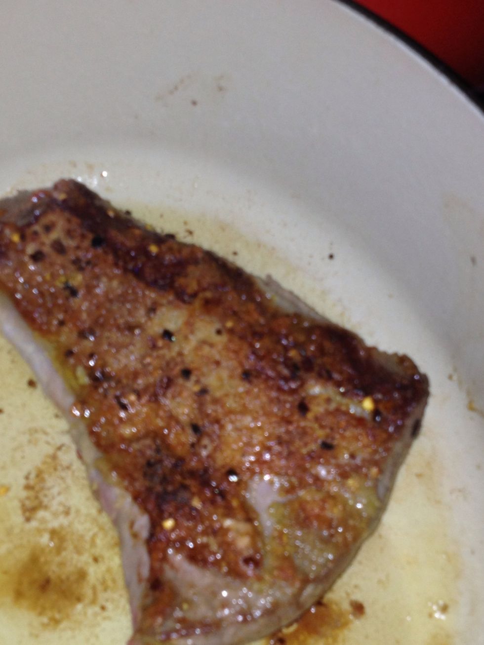 Sear both sides for about 5- 7 min each side once both sides are done add beer veggies and cilantro and more of same seasonings