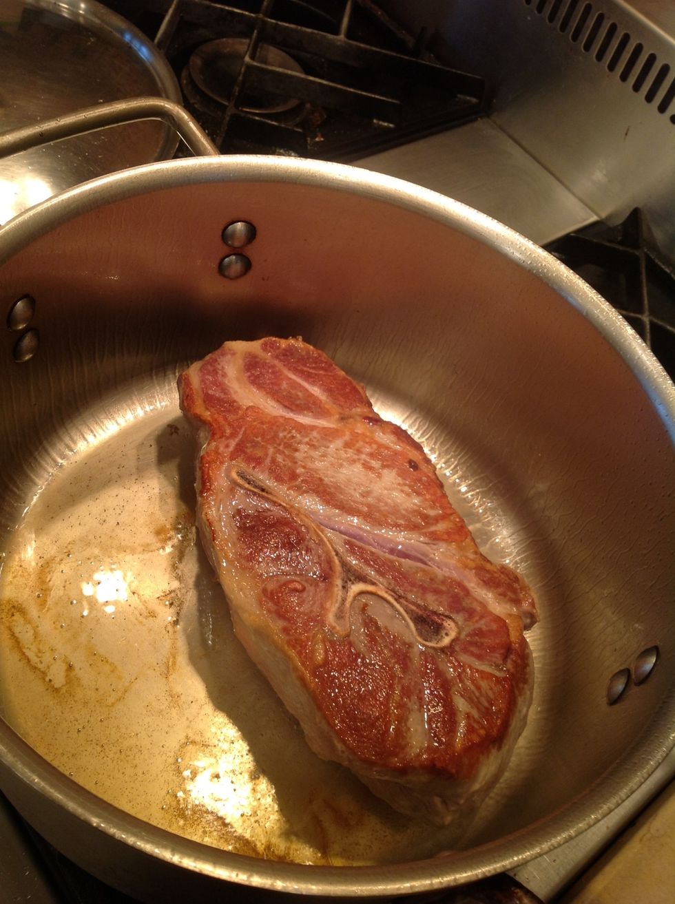 Sear pork shoulder in a deep pan