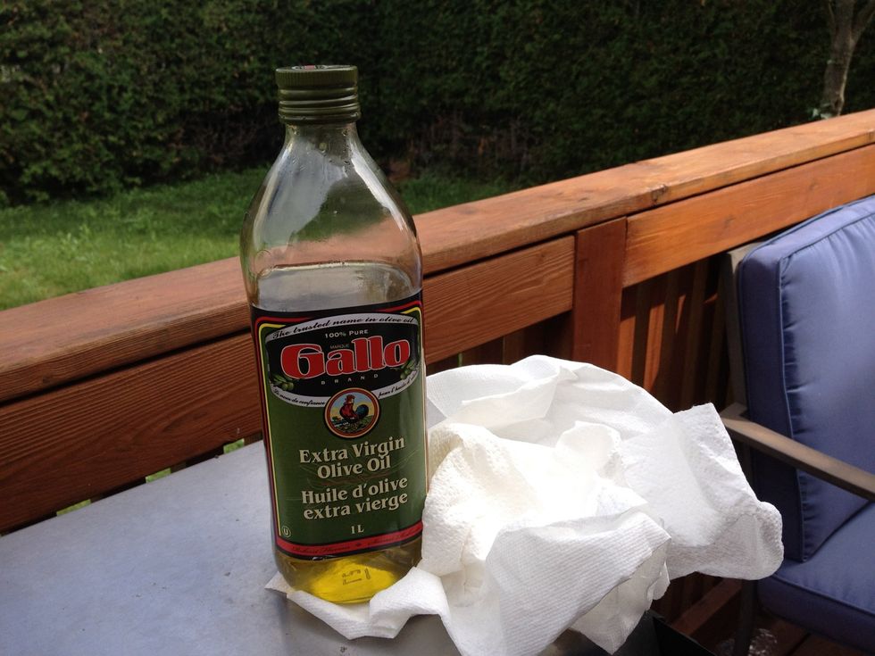 Season and clean the grill at the same time by running an oil soaked (not dripping) paper towel over it several times