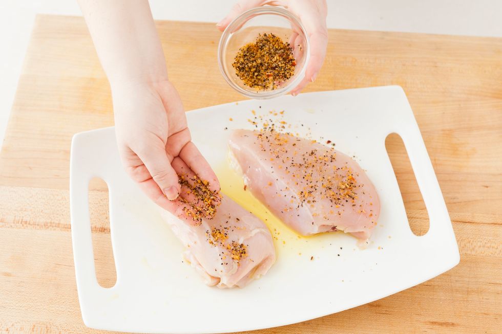 Season both sides of your chicken breasts with grill seasoning.