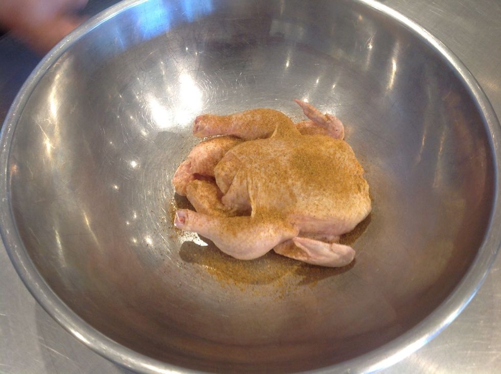 Season chicken in large bowl