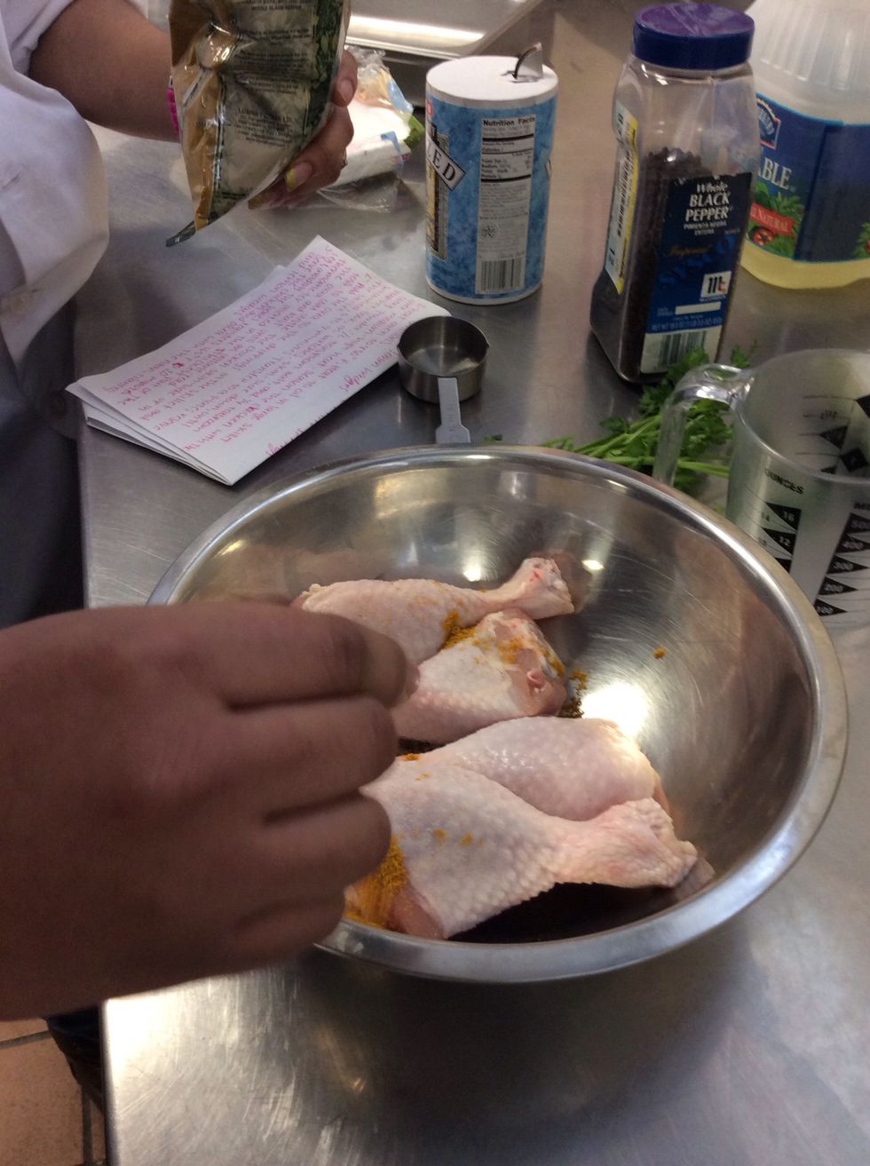 Season chicken with curry powder