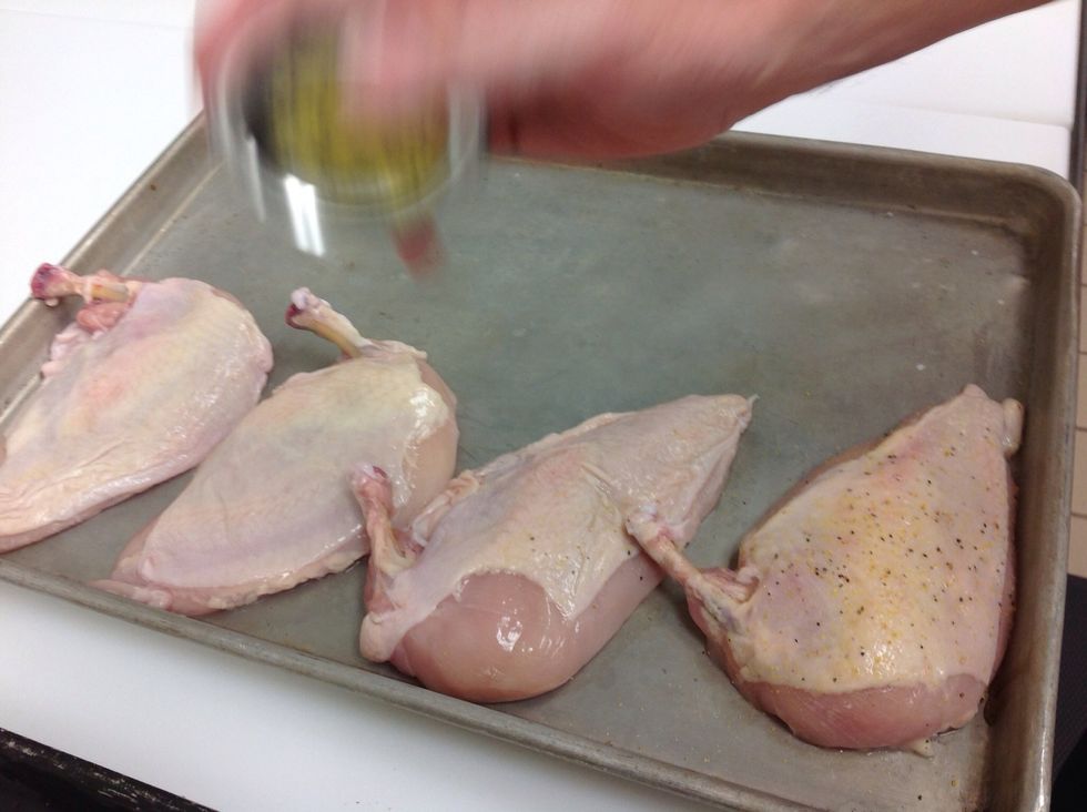 Season chicken with lemon pepper