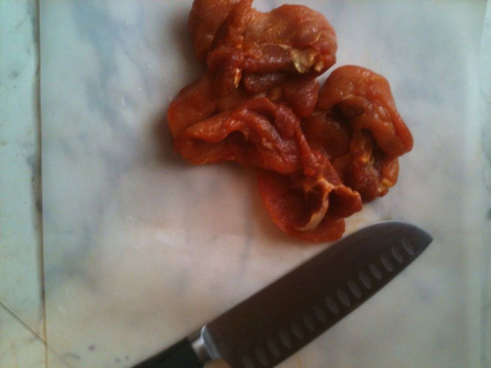 Season chops to your liking. I used Sazon from the brand Goya. Season salt & black pepper. Then dice up your meat.