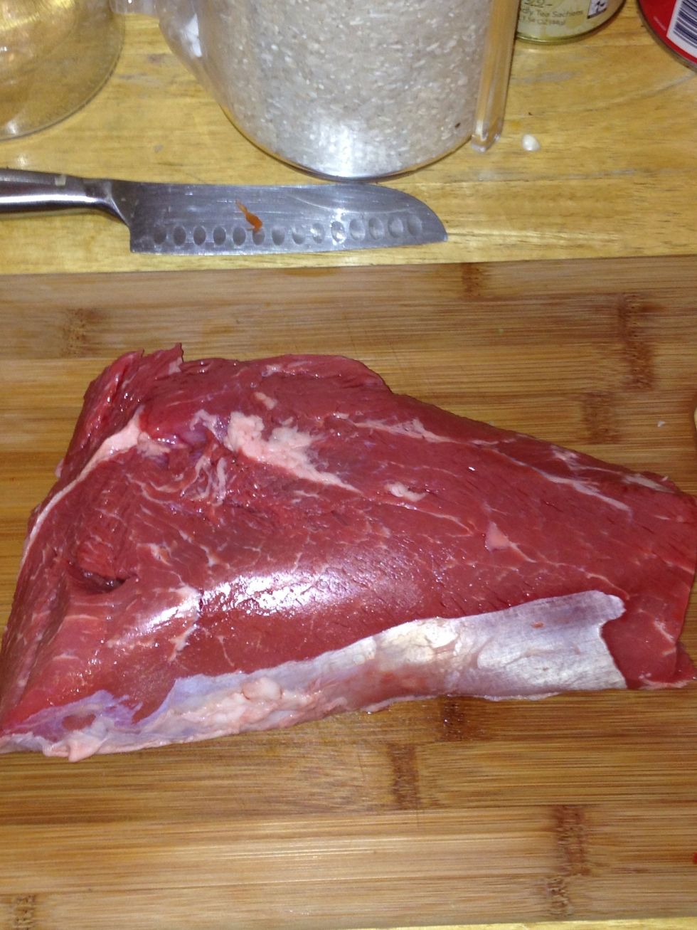 Season meat and cross cut top on both sides so seasoning sets in meat