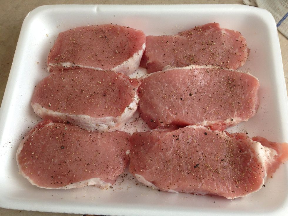Season pork with salt and pepper.