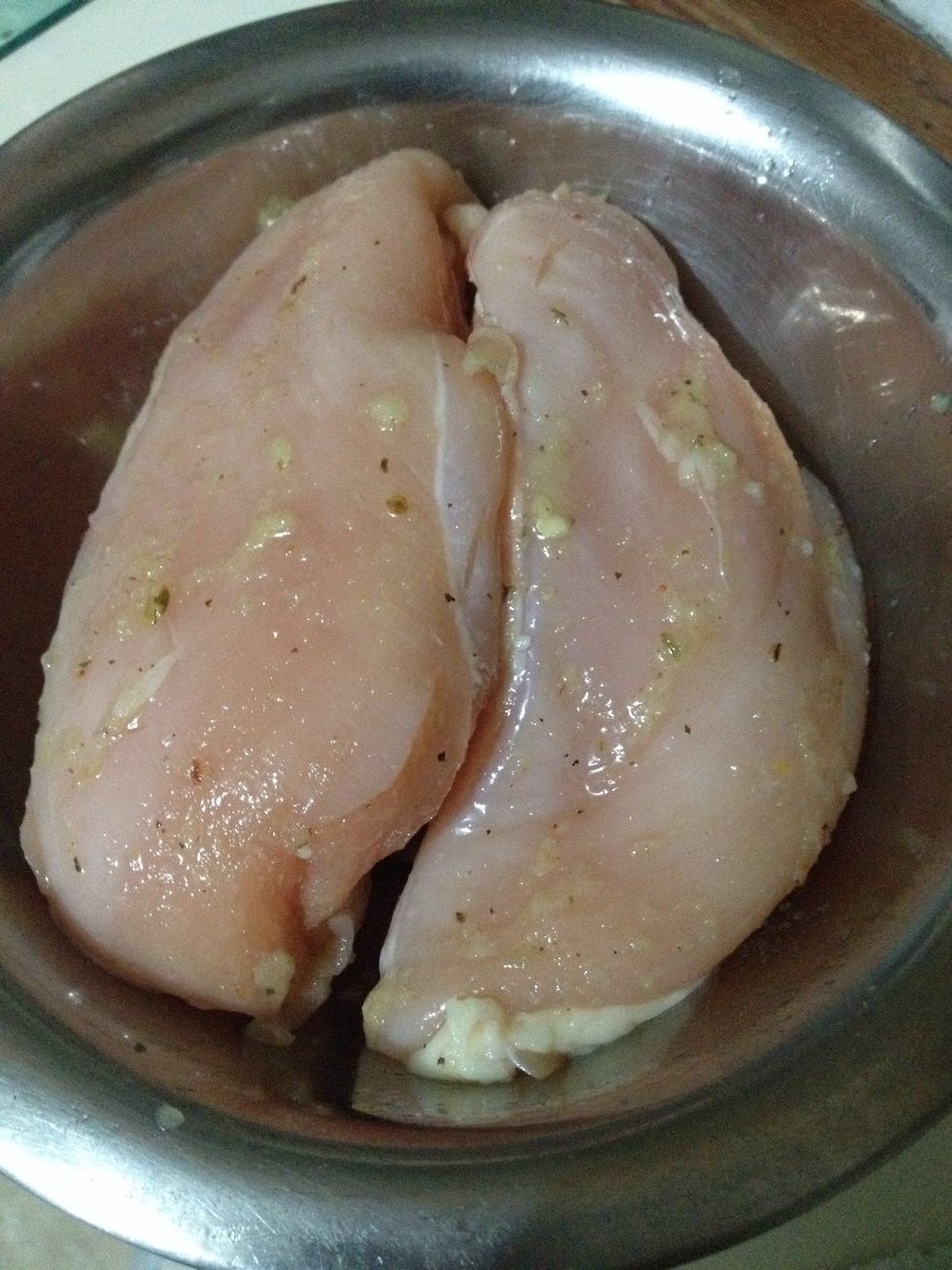 Season the chicken and cook it.