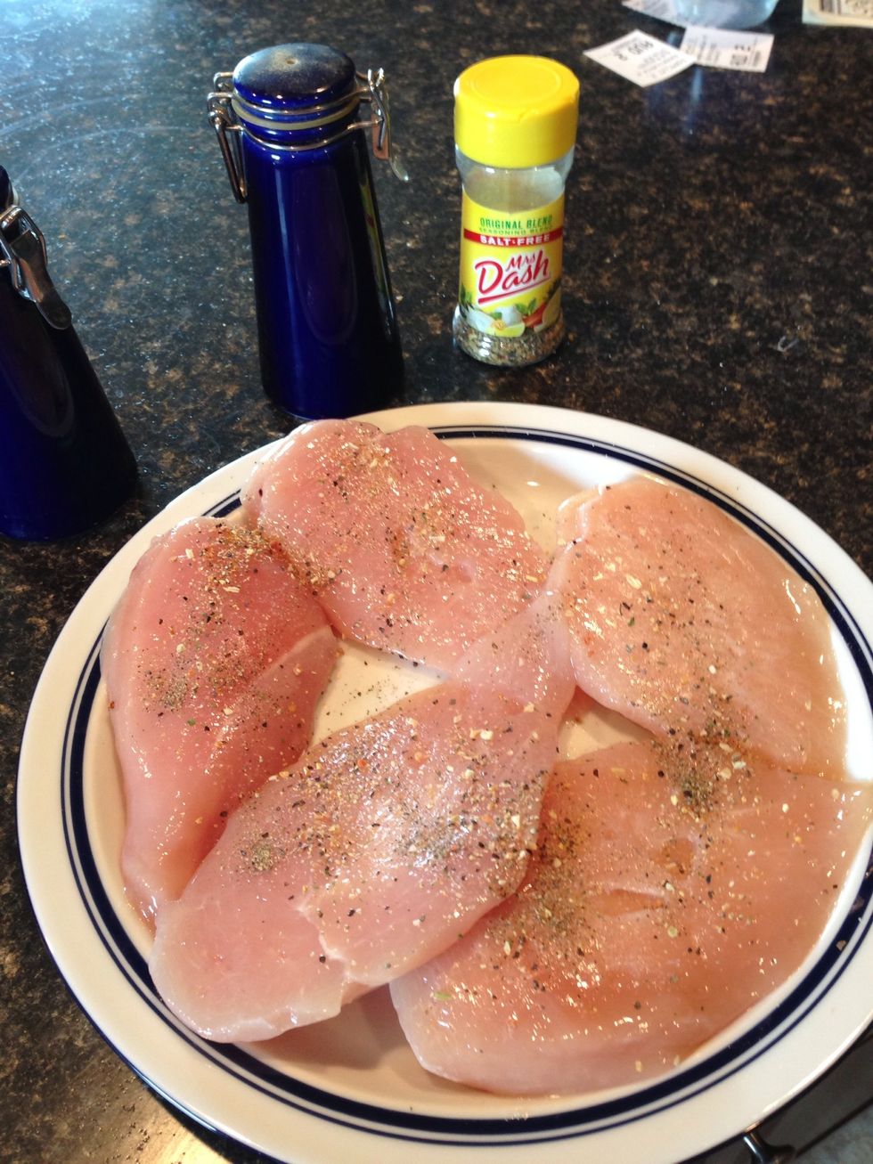 Season the chicken breast to your taste.