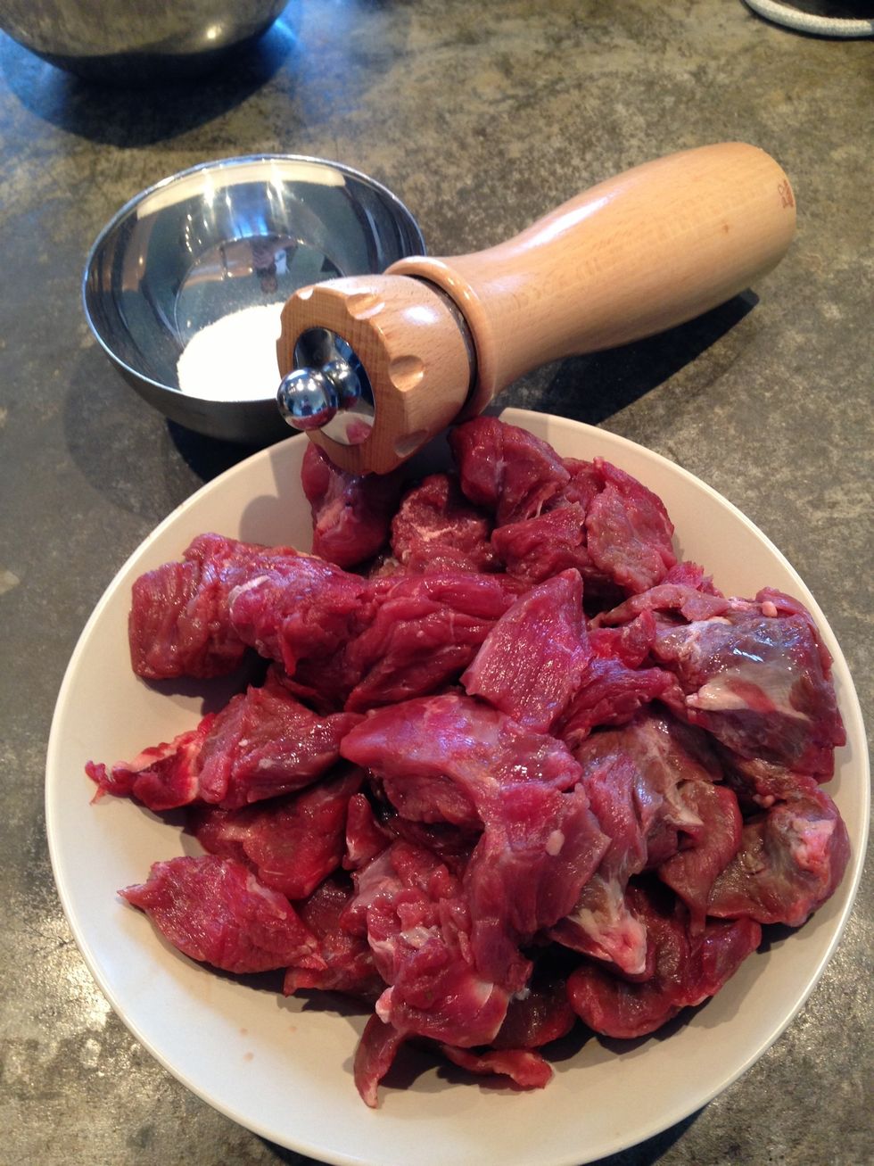Season the meat with pepper and salt.