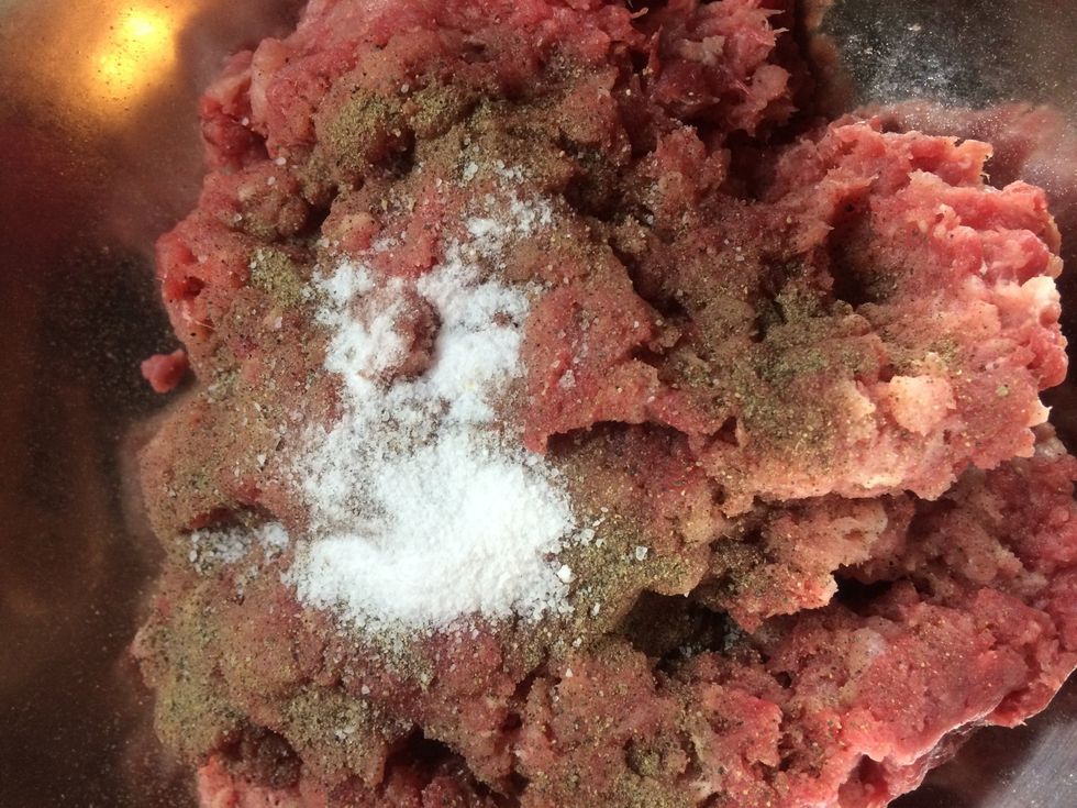 Season the meat with salt, pepper and cumin