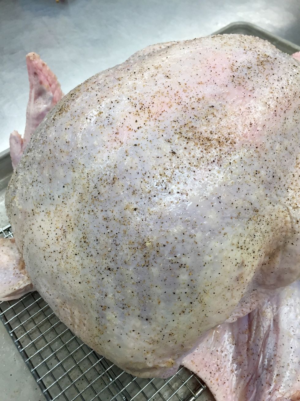 Season the turkey with salt, pepper etc.