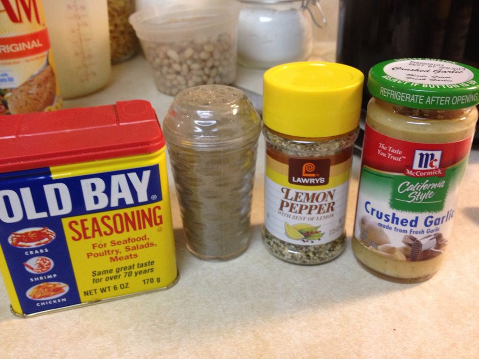 Season to taste with Old Bay seasoning, black pepper, lemon pepper, and a clove of garlic.