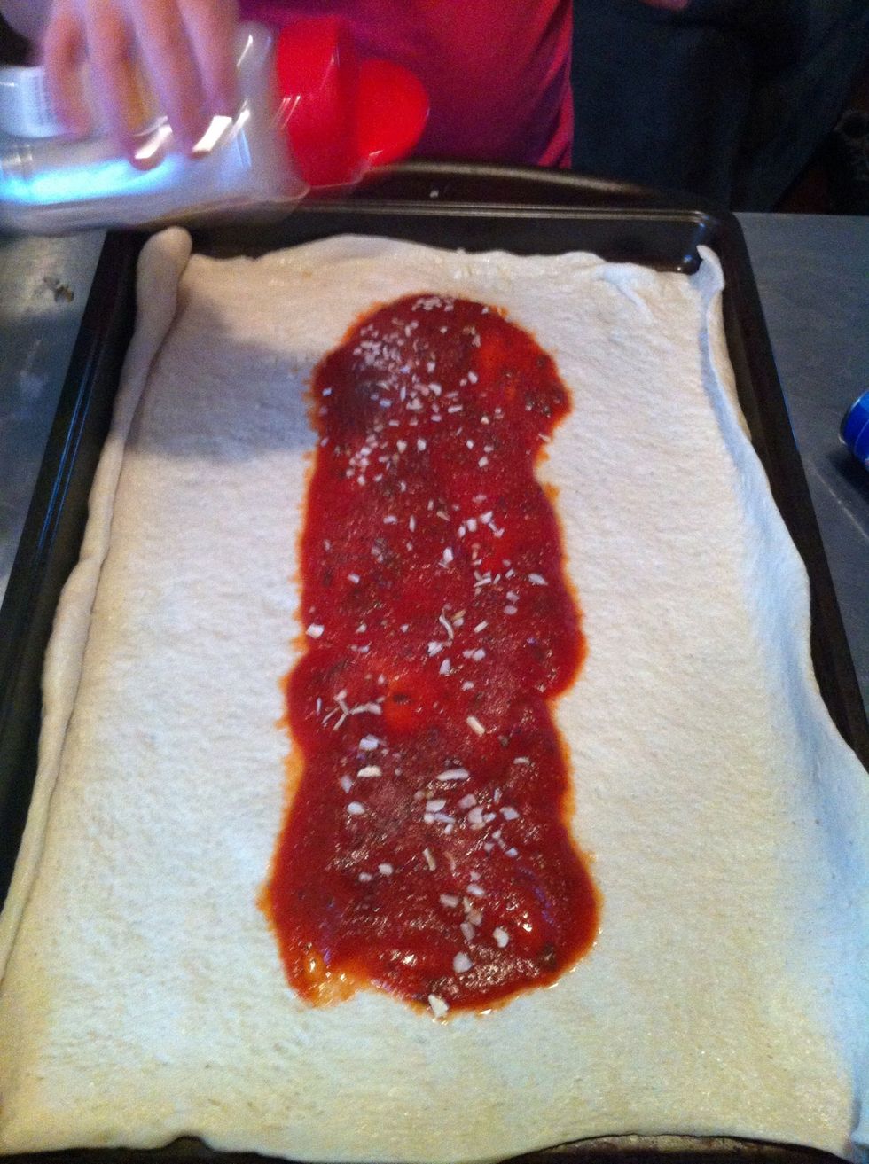 Season to taste with pepper, garlic, minced onion and oregano.