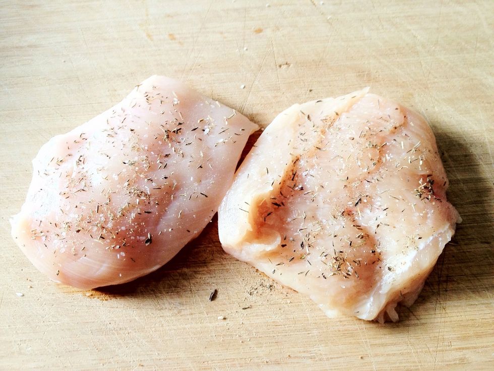 Season with a pinch of black pepper, dried thyme and kosher salt on both sides.