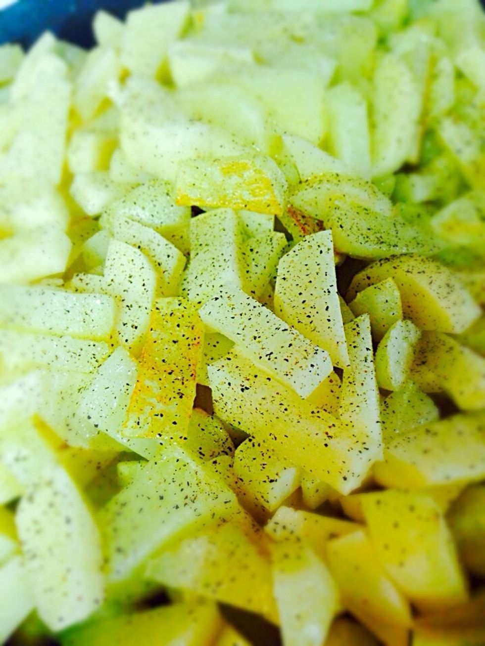 Season with salt and pepper and mix. Let it cook on a medium heat without cover. The deal is to brown the potatoes stirring occasionally before covering the pan to let it cook all the way though