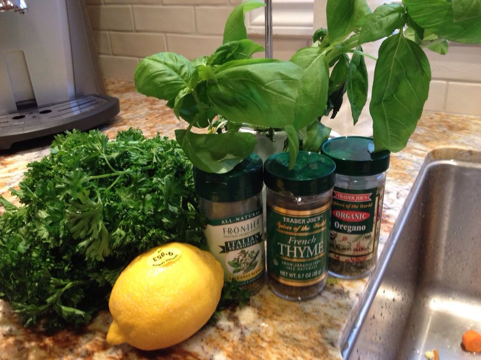 Season with thyme, oregano, fresh basil, fresh parsley and fresh lemon. You can also add fresh ground pepper & sea salt.