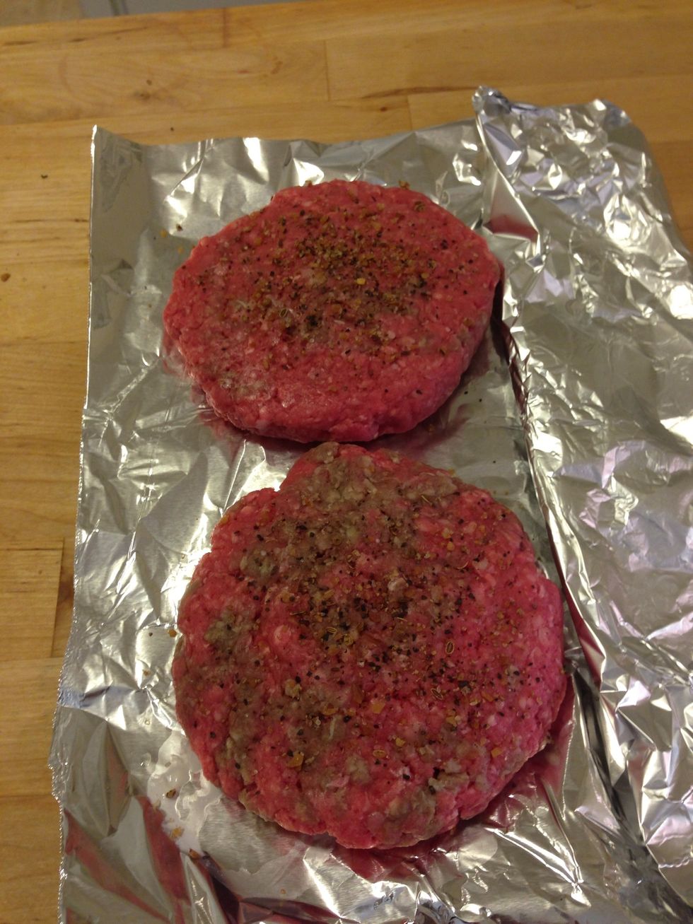 Season your burger if you like. I used McCormick steak seasoning. Now it's time to throw the burgers on the grill.