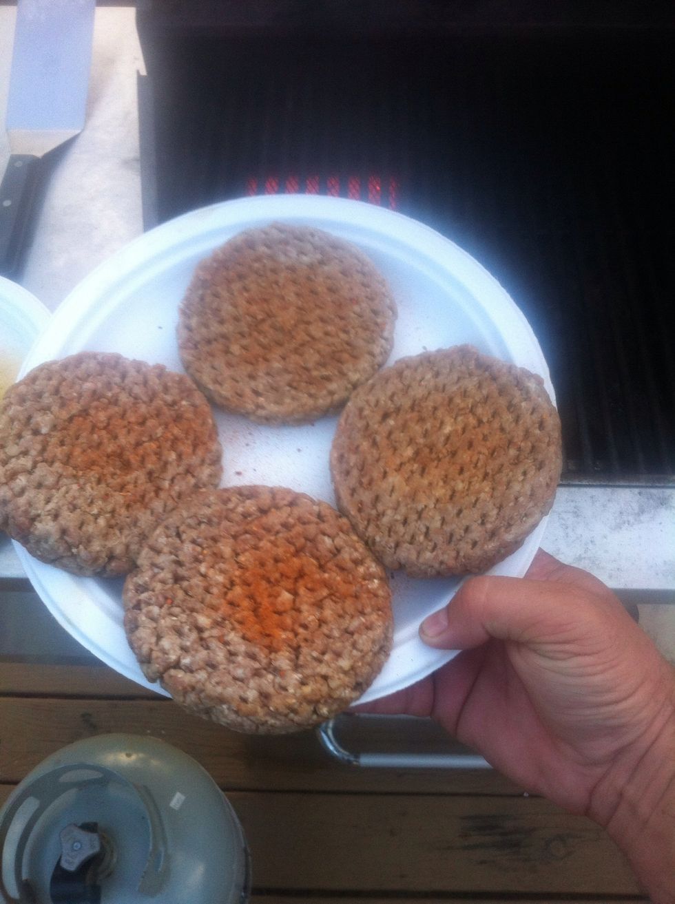 Season your burgers with your favorite rub or seasoning