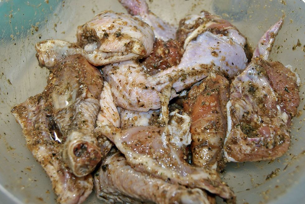 Season your chicken parts with bottled green seasoning or fresh seasoning. Anything kinda spicey and herby. Leave it for a while to marinate. Tip: you want bone in skin on chicken. More flavor.