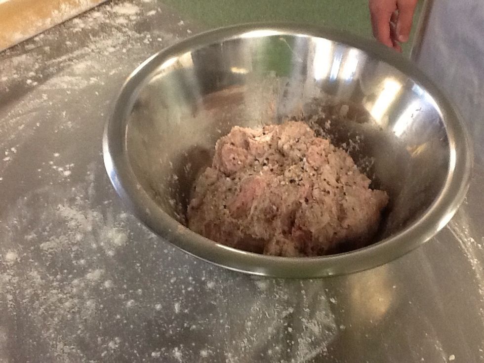 Season your sausage meat with salt and pepper.