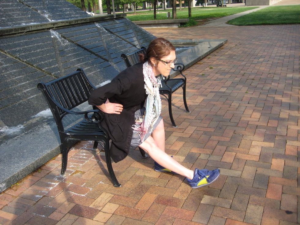 Seated calf/hamstring stretch \u2013 one leg bent, one straight with toes toward ceiling, bend forward at waist