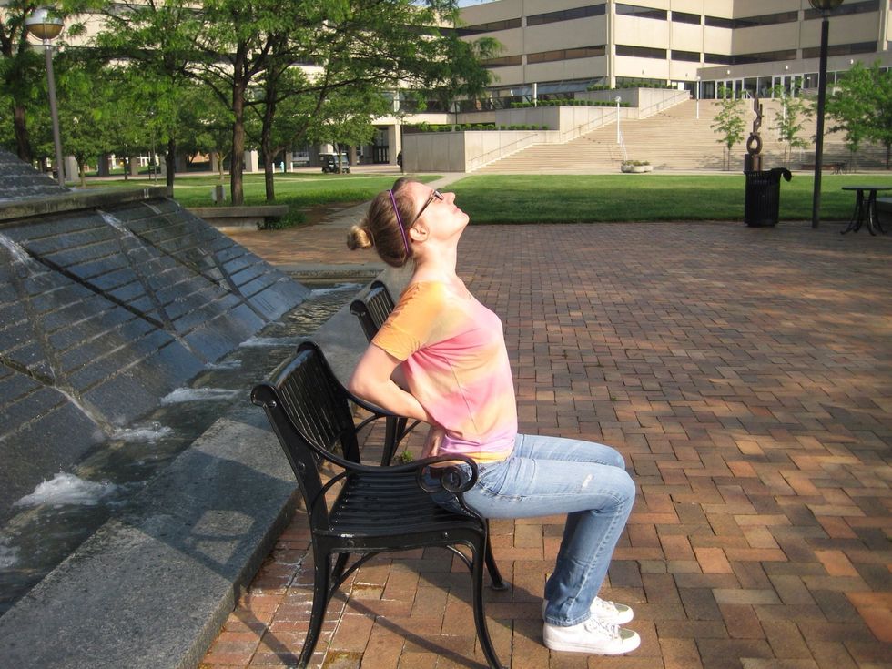 Seated camel \u2013 press hands into waist/lower back as you lean back