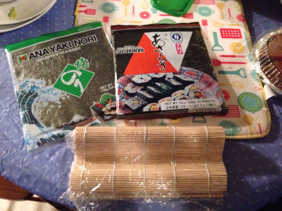 Seaweed and bamboo is very important for making sushi. Make sure to cover the bamboo with plastic wrap.