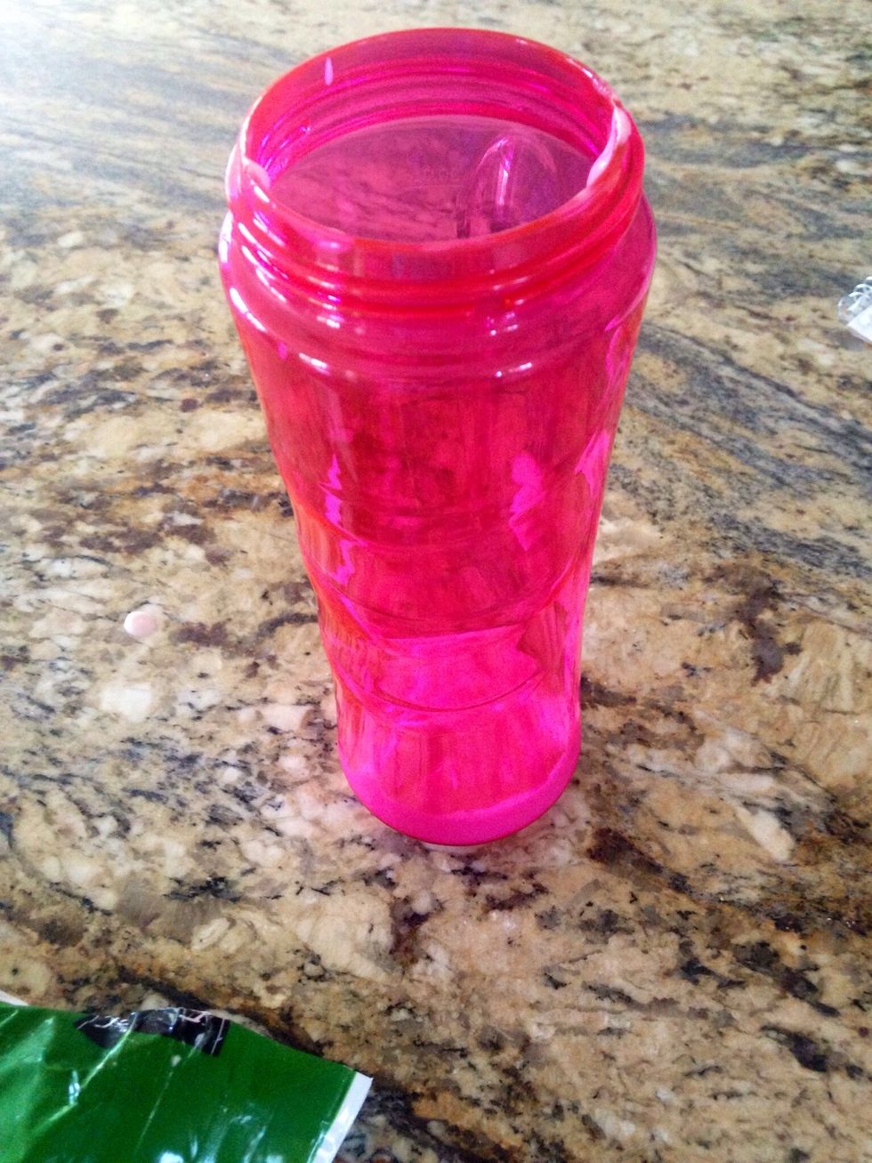 Second, add 1/3 cups of yogurt into the blender or cup. I like to use strawberry or vanilla.