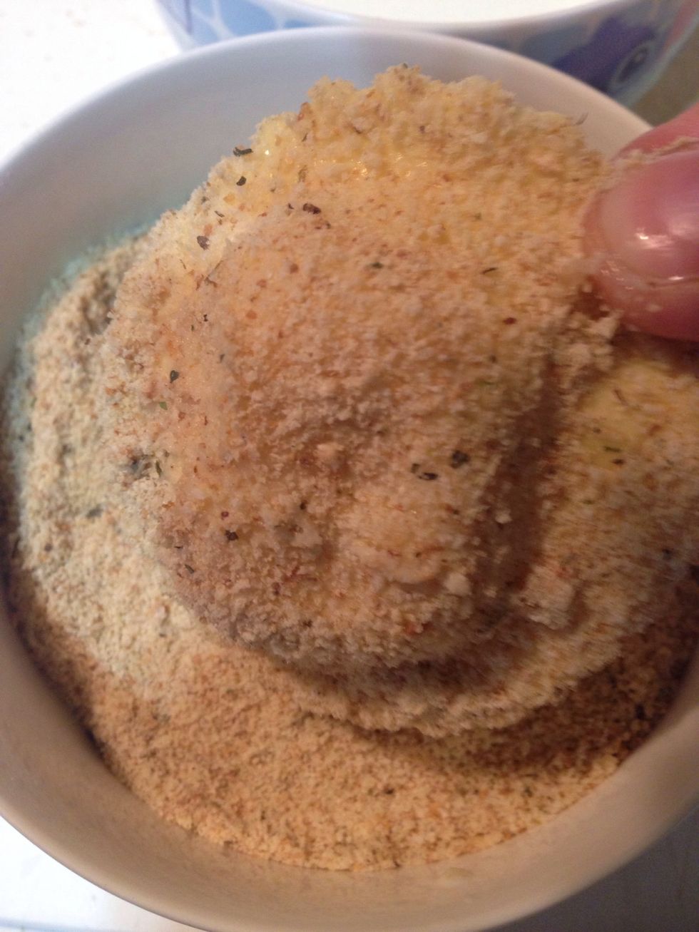 Second, coat it in bread crumbs.