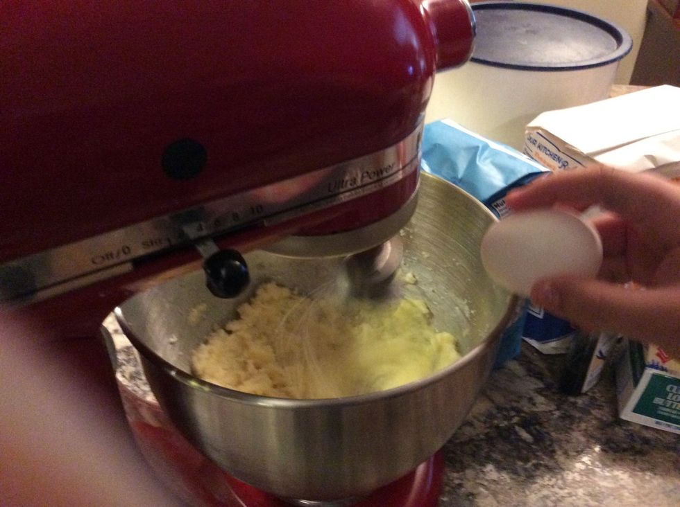 Second Crack the eggs in the mixer one at a time