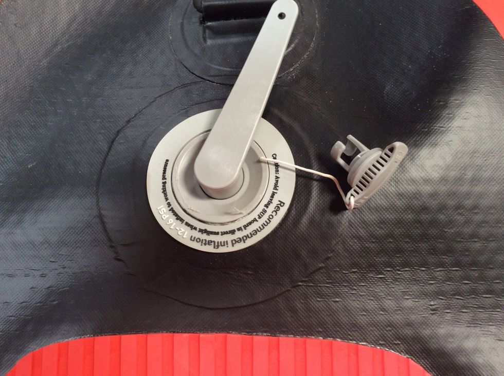 Second, insert wrench into valve so that the wrench teeth lock in place.