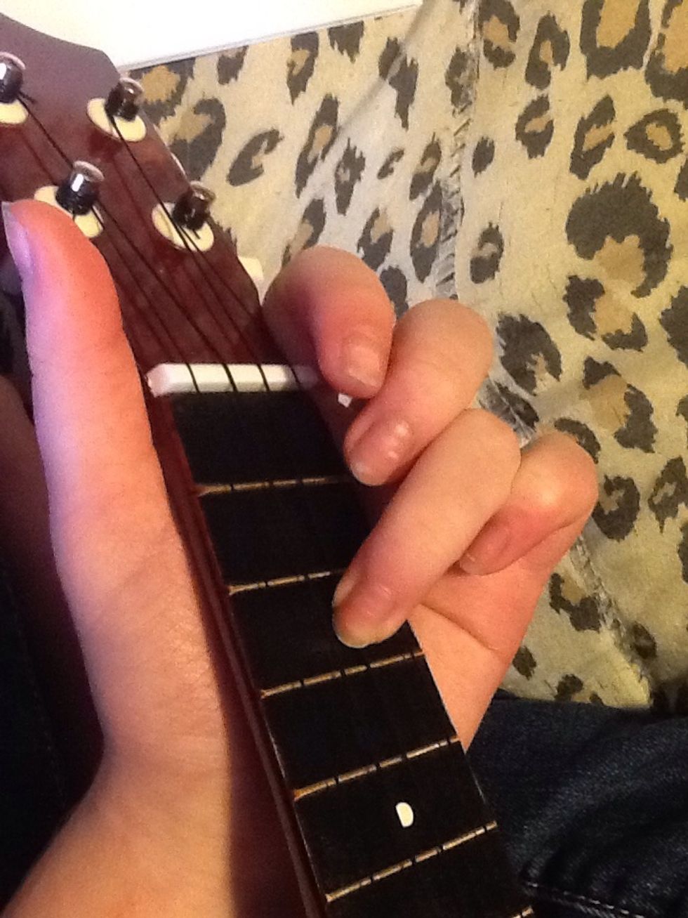 Second Note - G (E string, third fret)