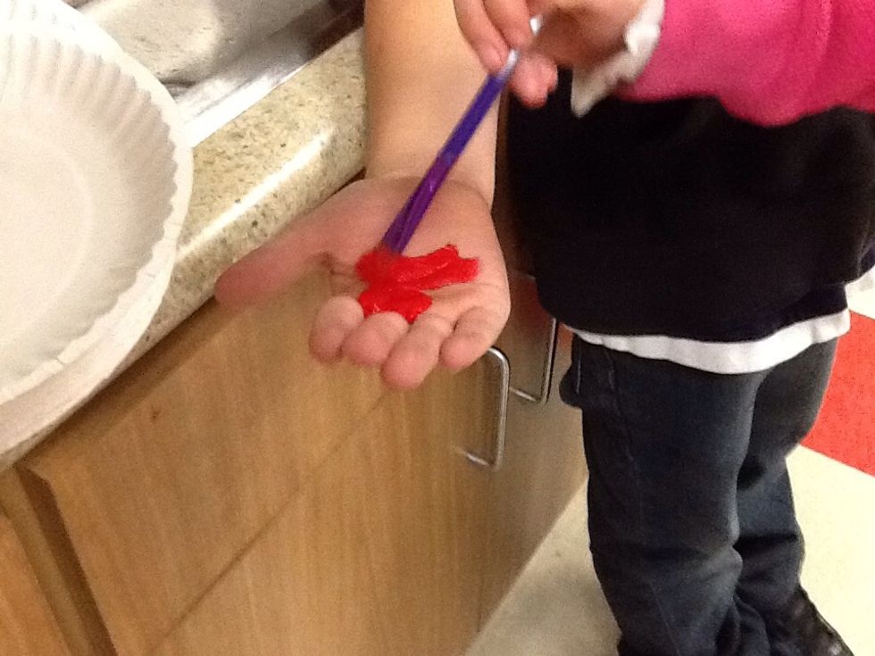 Second, paint your hand red.