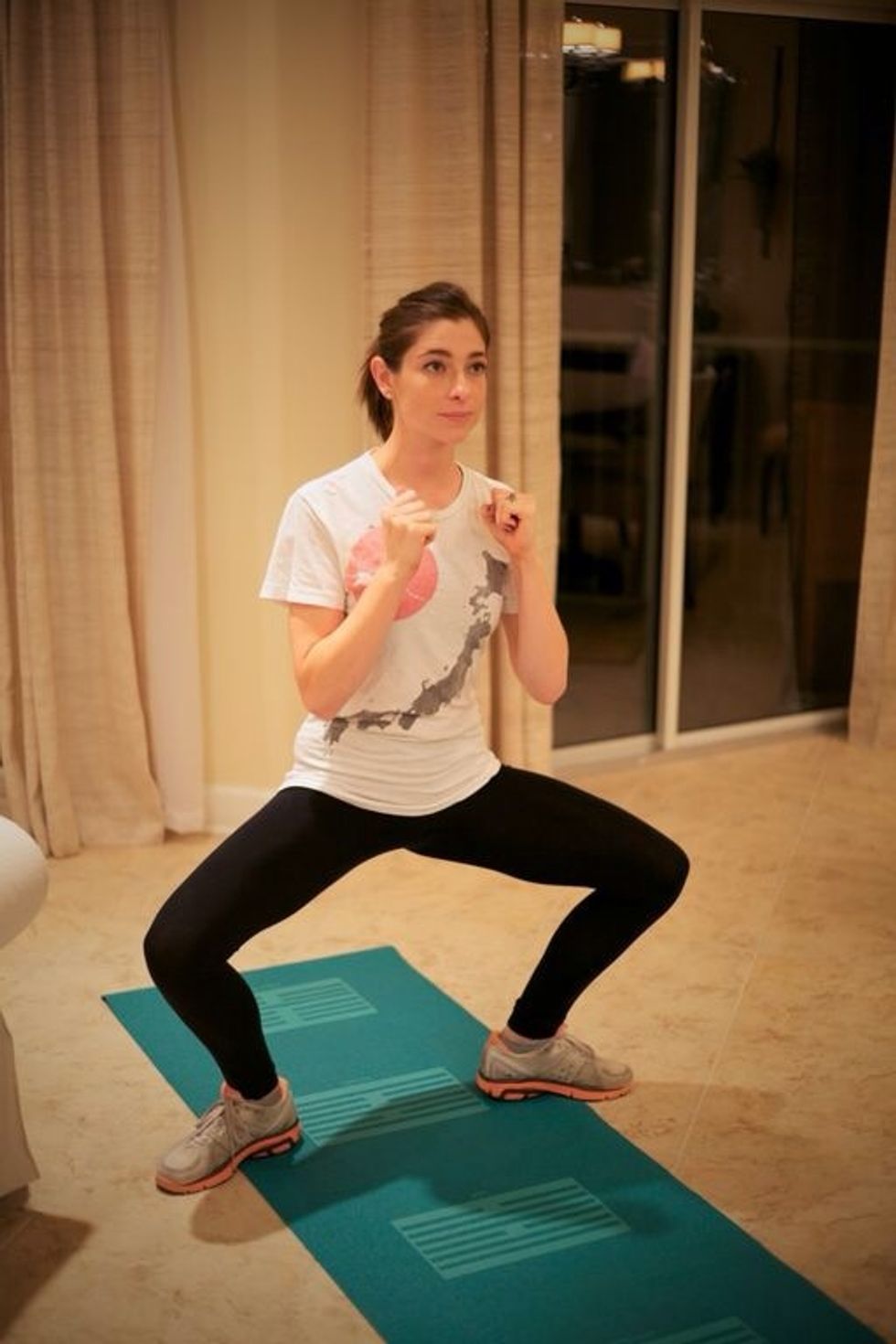 second position pli\u00e9: make sure to turn toes out and keep bum tucked under and torso straight. Go as far down while keeping feet on the ground. Do 20-30