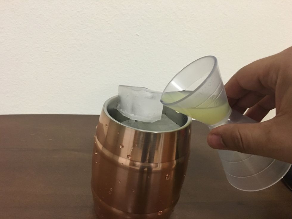 Second, pour in your lime juice.