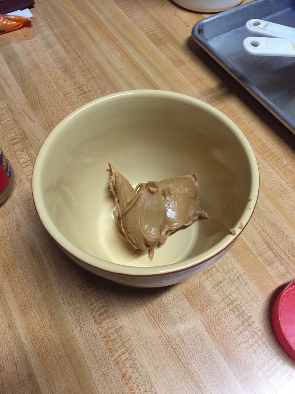 Second, put 1 1/2 cups of peanut butter in a medium size bowl.