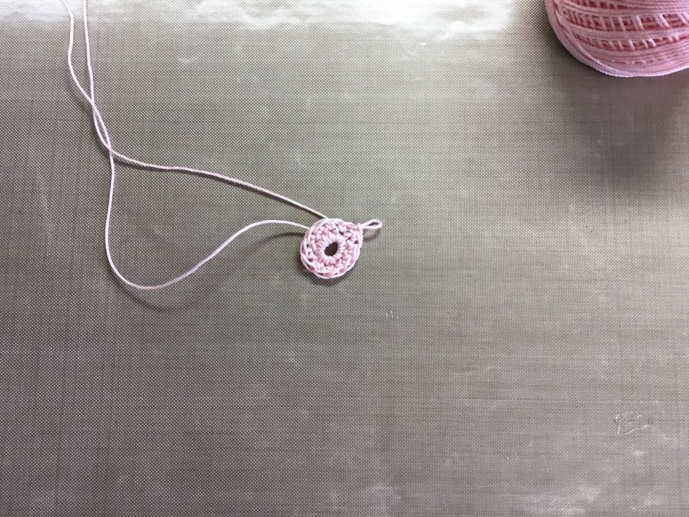 Second row: single crochet in each of the twelve stitches.