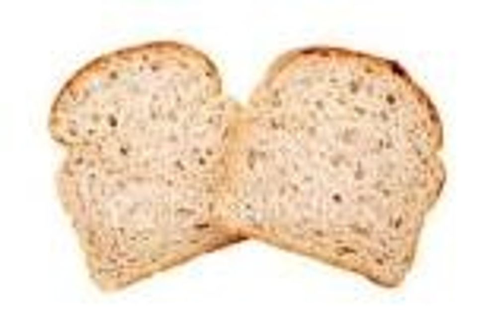 Second  take the pieces of bread and put them side to side.