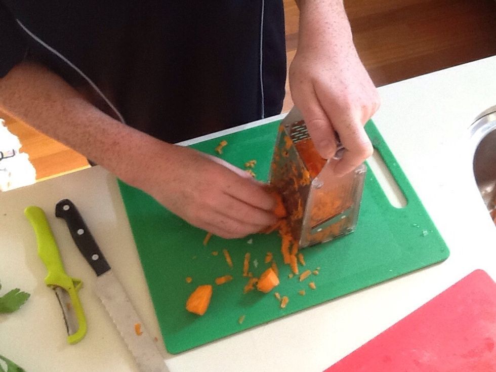 Second you grate the carrot.