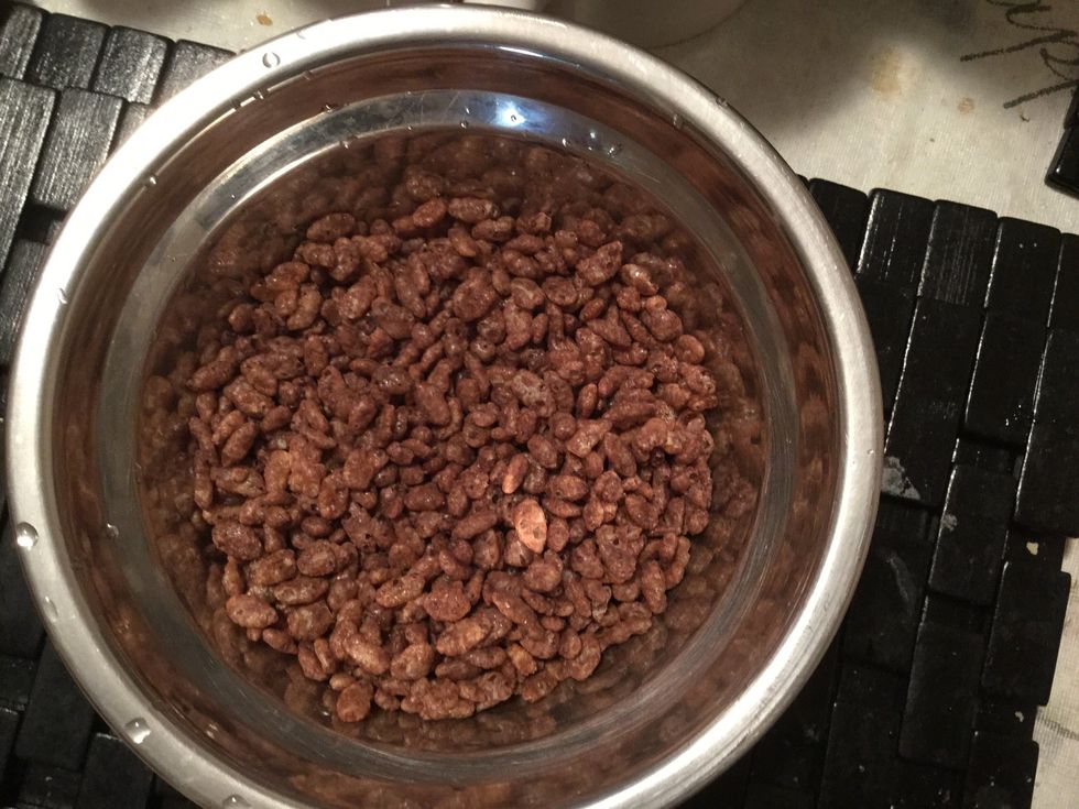 Secondly, pour two cups of cereals into the other bowl.